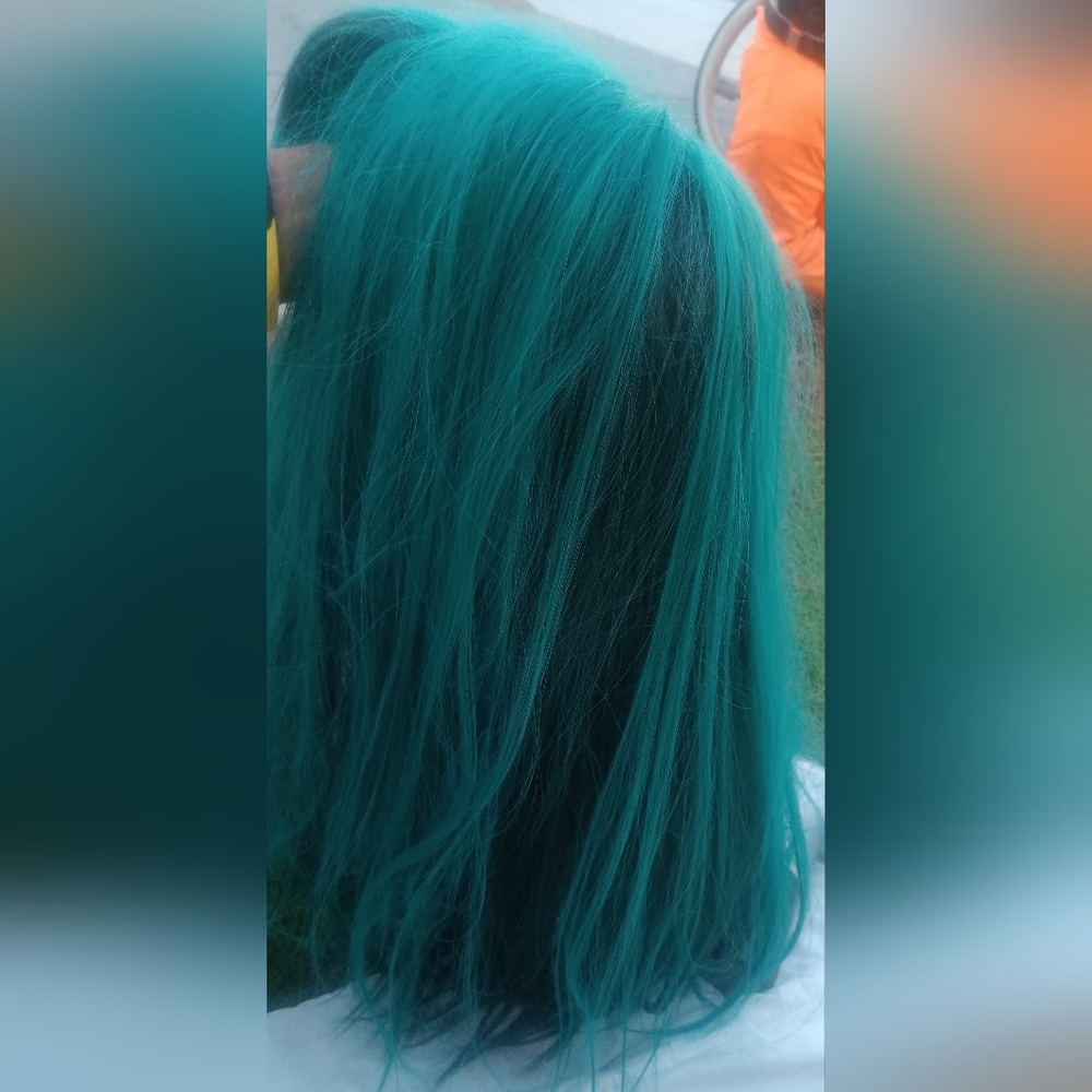Vibrant Blue Layered Wig with Gradient Effect
